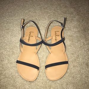 Lulu’s navy strapped sandals